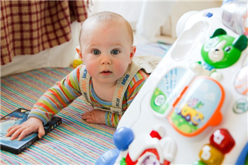 image of a baby at home