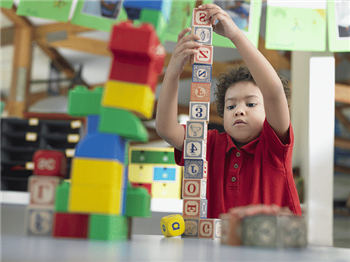 boy building blocks