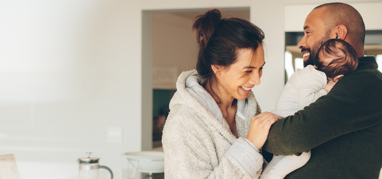 image of a family smiling and happy